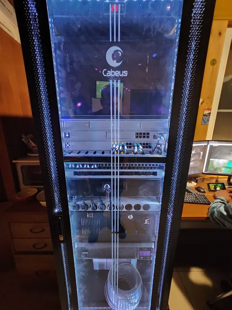 Glass-door rack with home server and network equipment